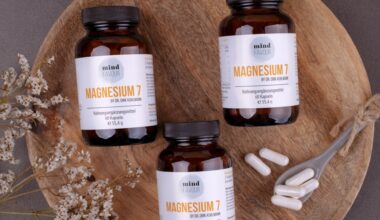 three bottles of magnesum on a wooden plate
